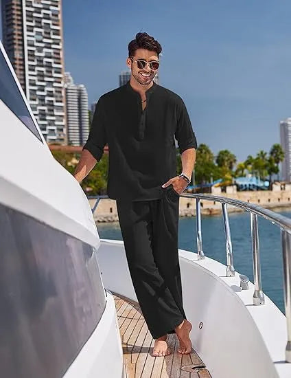 Men's casual cotton suit set in a solid colour, featuring a long-sleeved top and matching trousers.