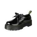 Women's thick soled leather shoes with cross strap design and lace closure in black colour