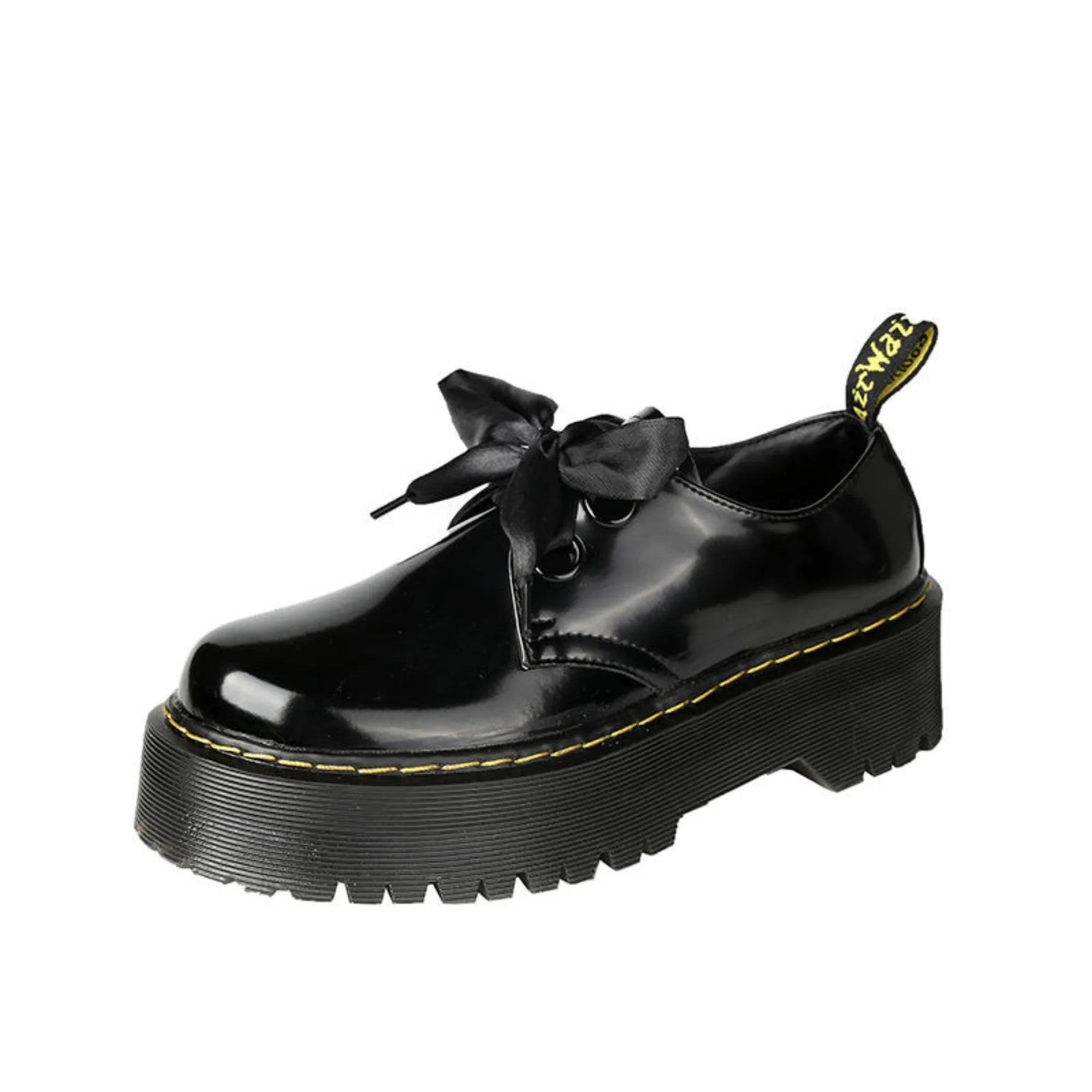 Women's thick soled leather shoes with cross strap design and lace closure in black colour