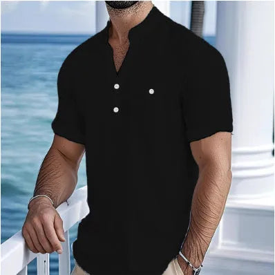 Man wearing a light-coloured linen stand collar short sleeve t-shirt in a relaxed fit.