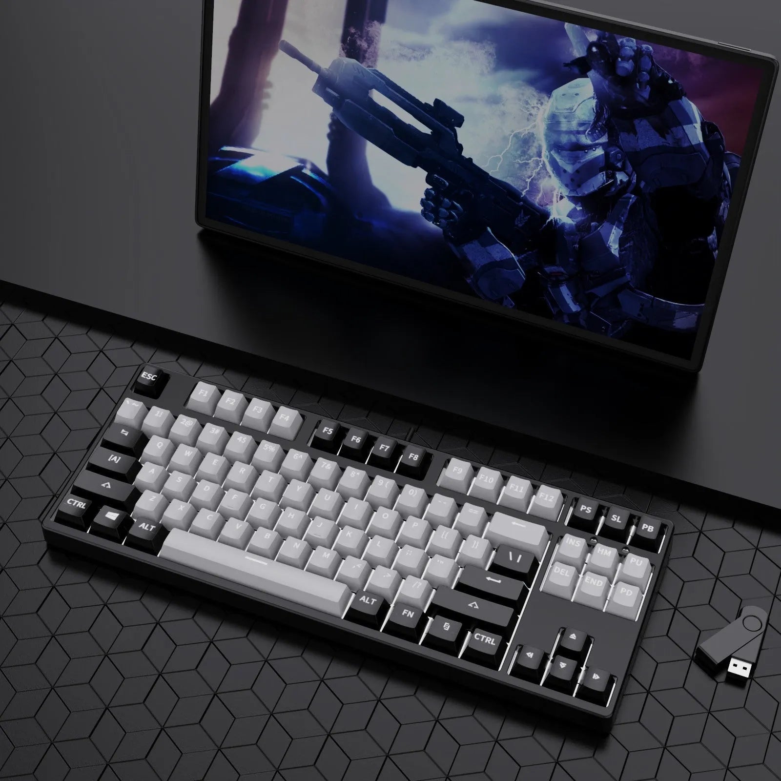 87-key wired mechanical gaming keyboard with hot-swappable switches shown in a two-tone colour scheme on a metal chassis.