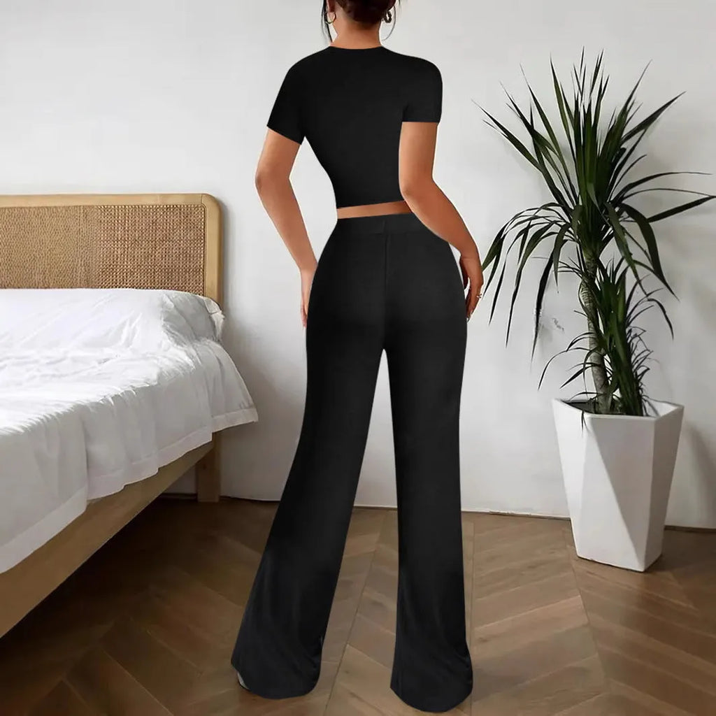 Black high waist polyester trousers with matching short sleeve t-shirt top women's suit set