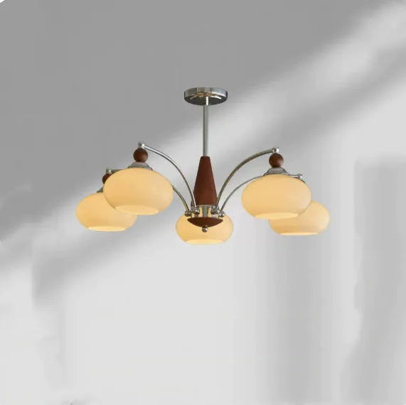 Persimmon glass and chrome chandelier with multiple lampshades in a Middle Ancient style