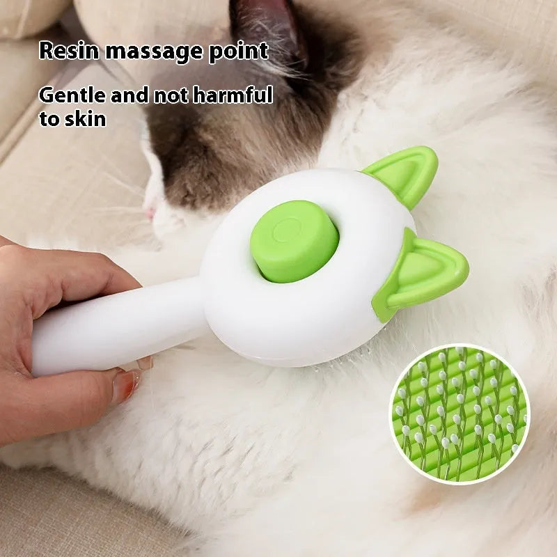 Self-cleaning cat grooming comb with stainless steel bristles in greenish white and orange white colour options