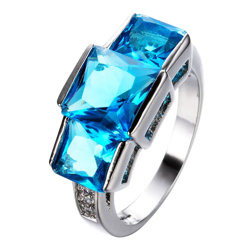 Copper electroplated colourful ring ornament in geometric design showing multiple colour options
