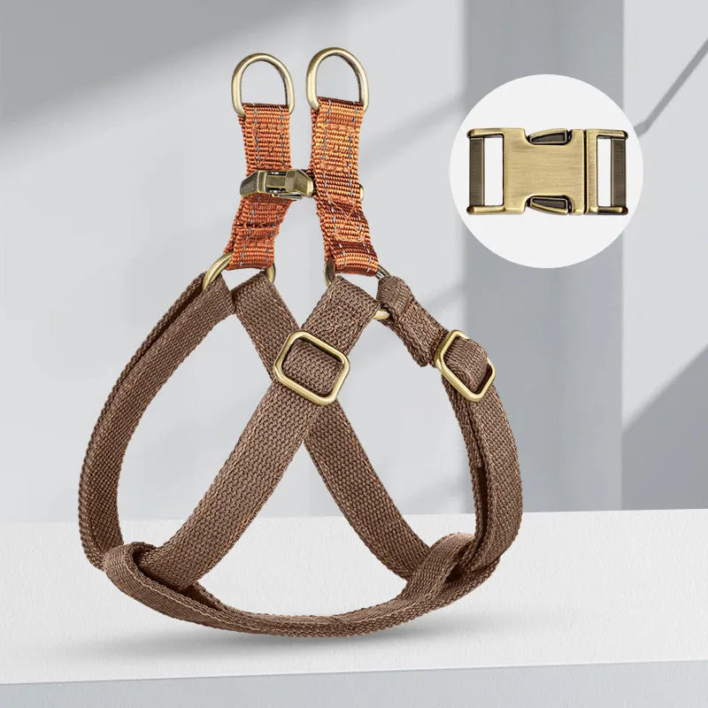 Brown vest style dog leash with cotton belt and alloy fastener on small dog