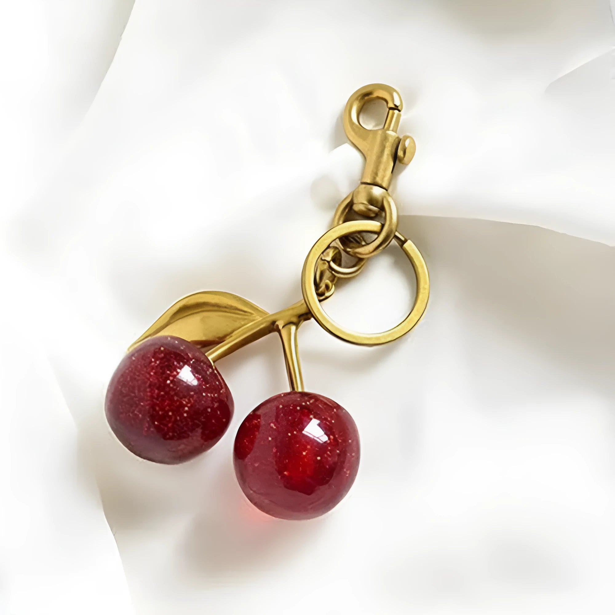Zinc alloy three-dimensional cherry key ring pendant in red colour