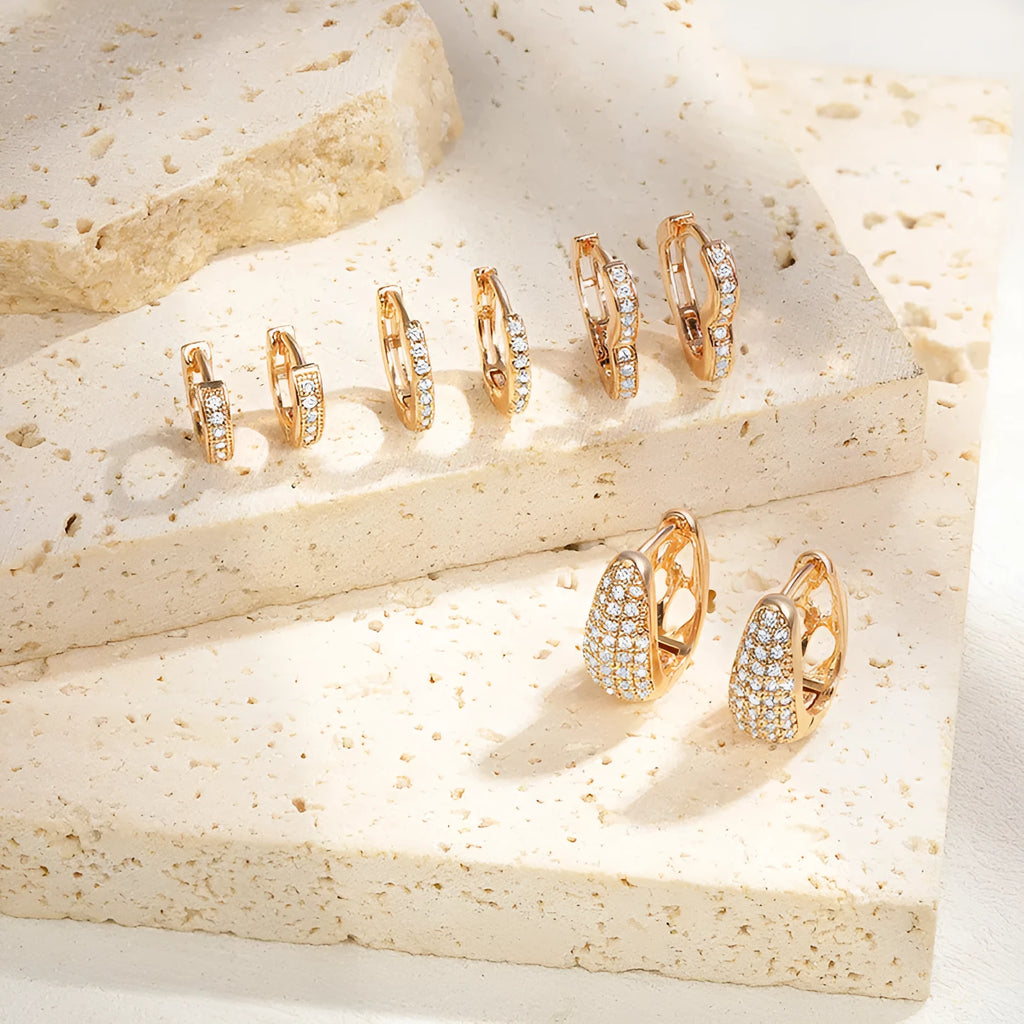 Gold plated heart-shaped clip earrings with zircon accents in four colour options
