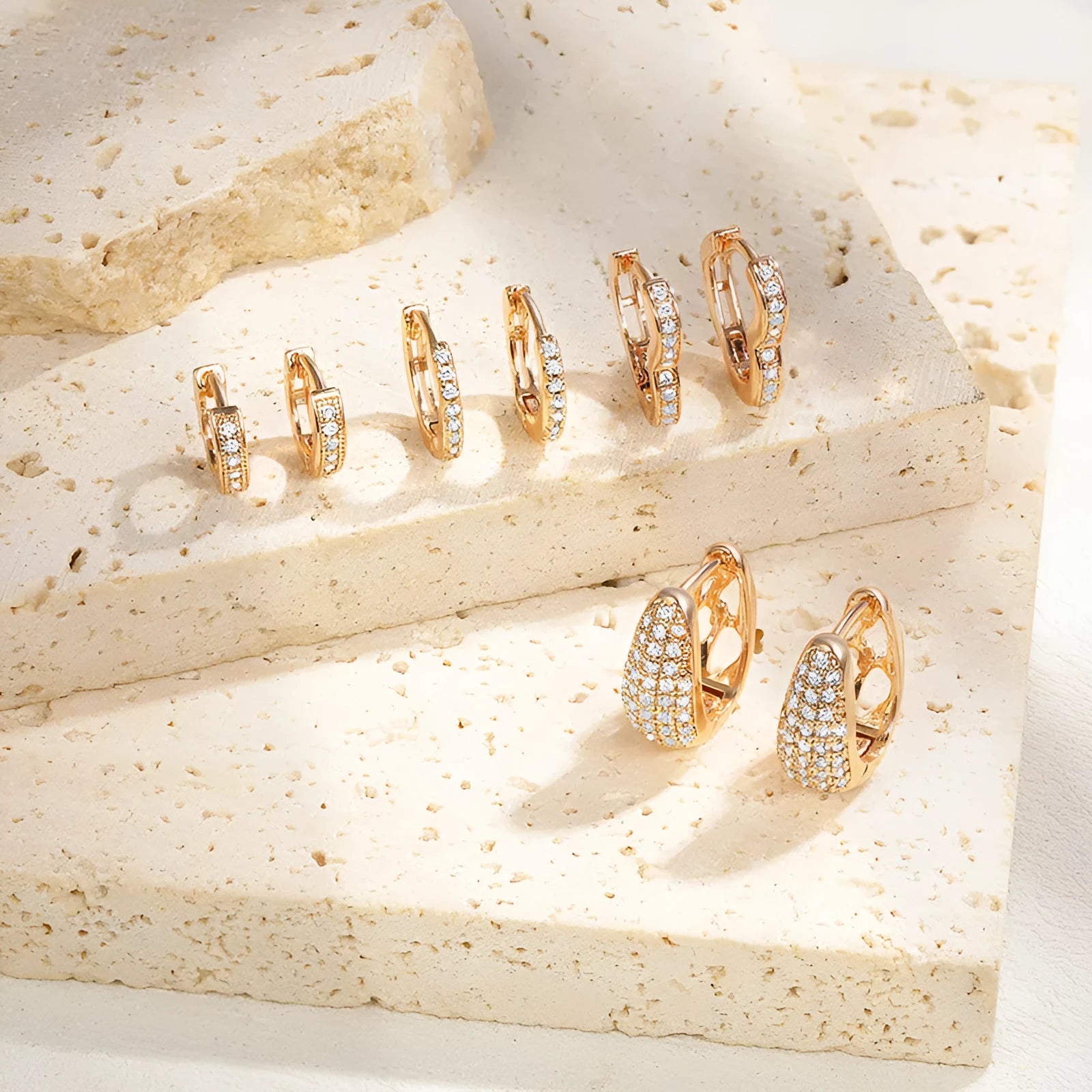 Gold plated heart-shaped clip earrings with zircon accents in four colour options