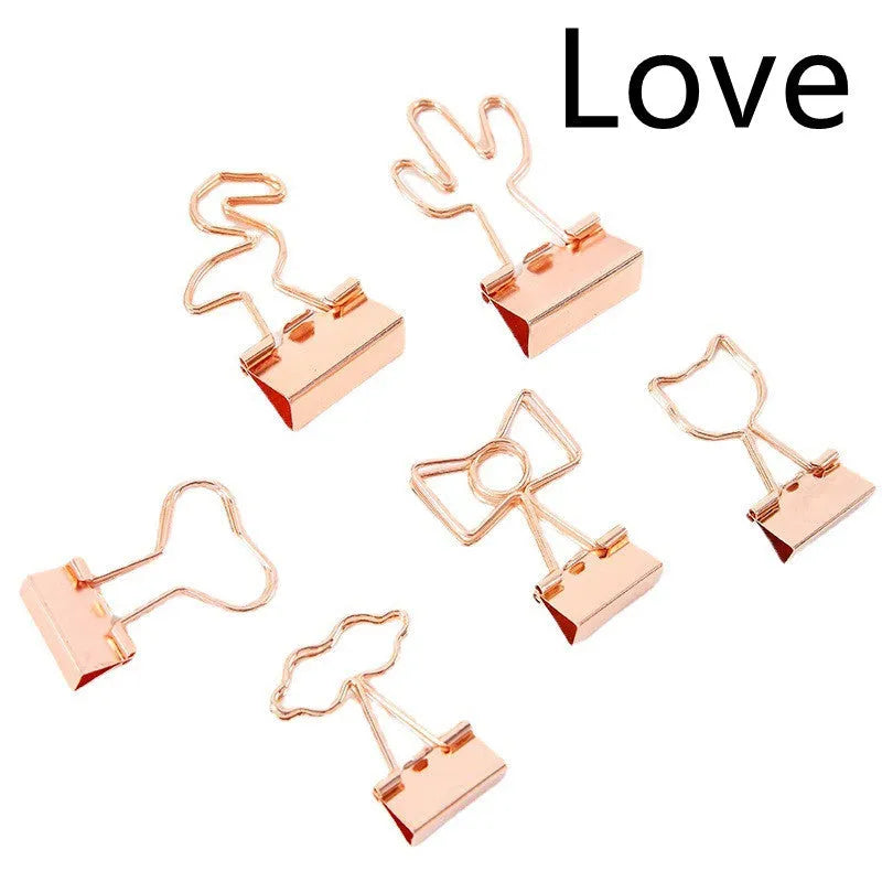 Gold-plated long-tail metal clip with a choice of bow, cactus, cat, flamingo, love, or cloud decorative design.