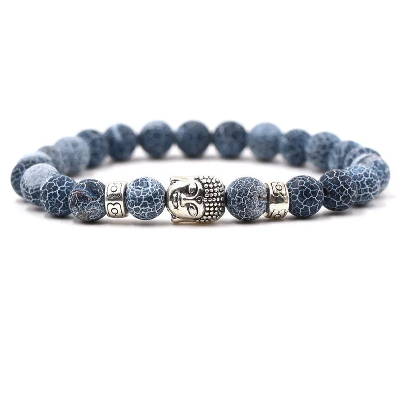 Natural stone stretch bracelet with tigereye, volcanic rock and turquoise beads on wrist