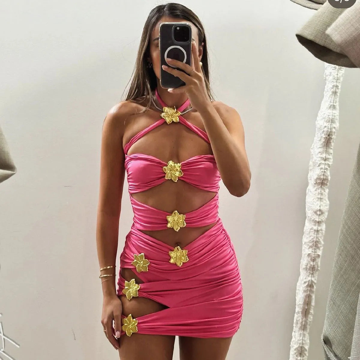 Solid colour high-waisted one-piece swimsuit with hollow-out tube top and matching short skirt for women.