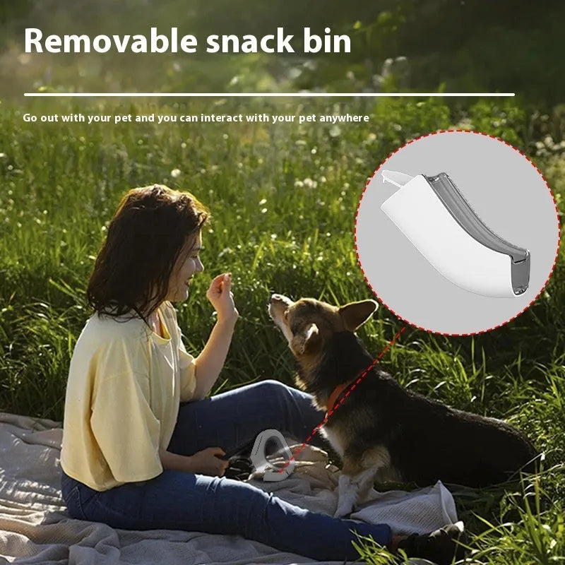 White plastic pet leashing device with spotlight light and snack bin box tractor ring