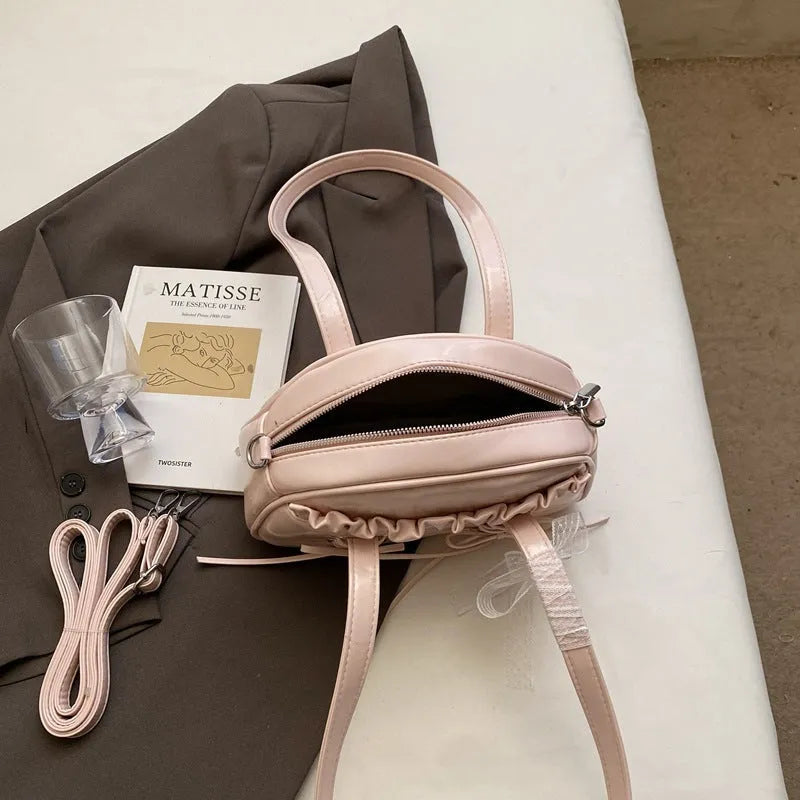 Women's casual PU leather handbag with bandage bow detail and crossbody strap