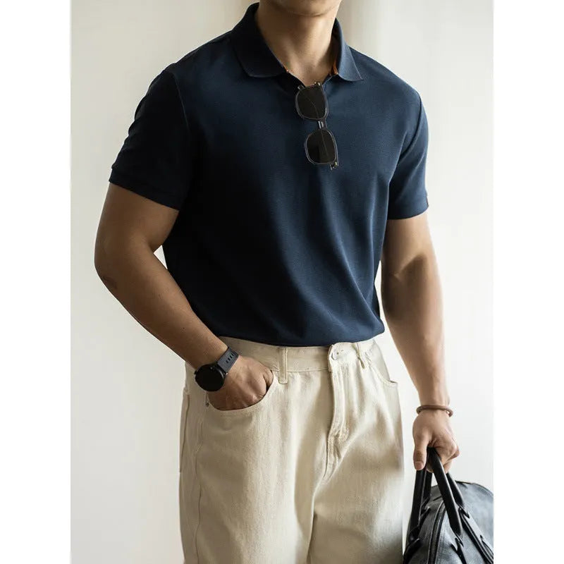 American-style cotton-polyester breathable short-sleeved polo shirt in blue colour showing regular fit and casual styling