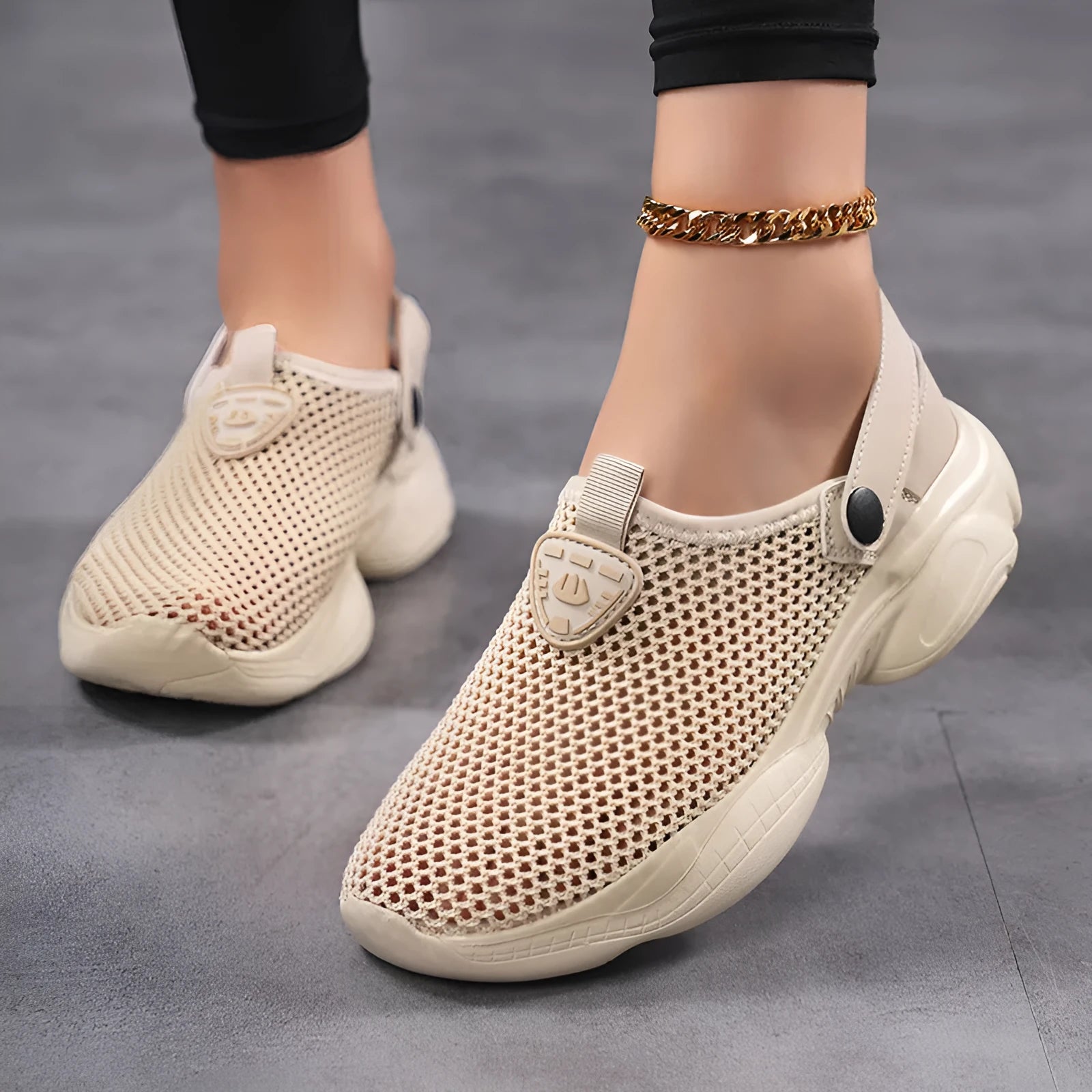 Women's Flyknit sports sandals in beige colour showing round toe holder and breathable upper construction