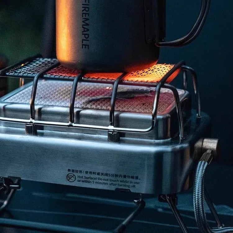 Portable outdoor heating stove with metal finish shown expanded to 180x167x125mm and collapsed for storage