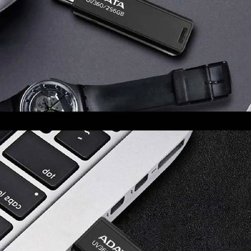 Black car mounted USB flash drive with compact dimensions showing waterproof flexible design