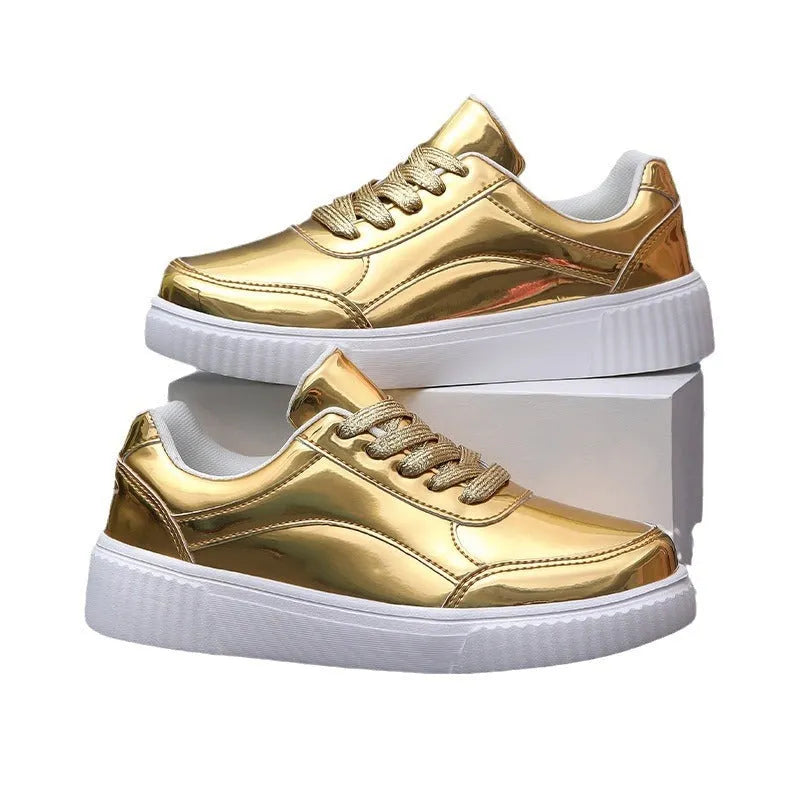 Rose gold sequinned platform sneakers with round toe and thick sole on a white background